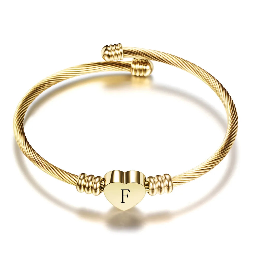 Hjertearmbånd med initial guld f