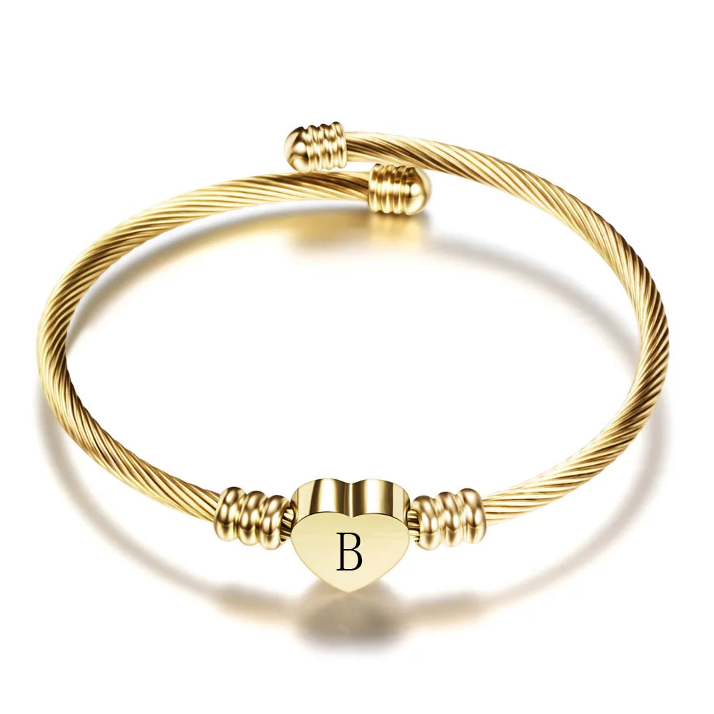 Hjertearmbånd med initial guld b