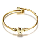 Hjertearmbånd med initial guld x
