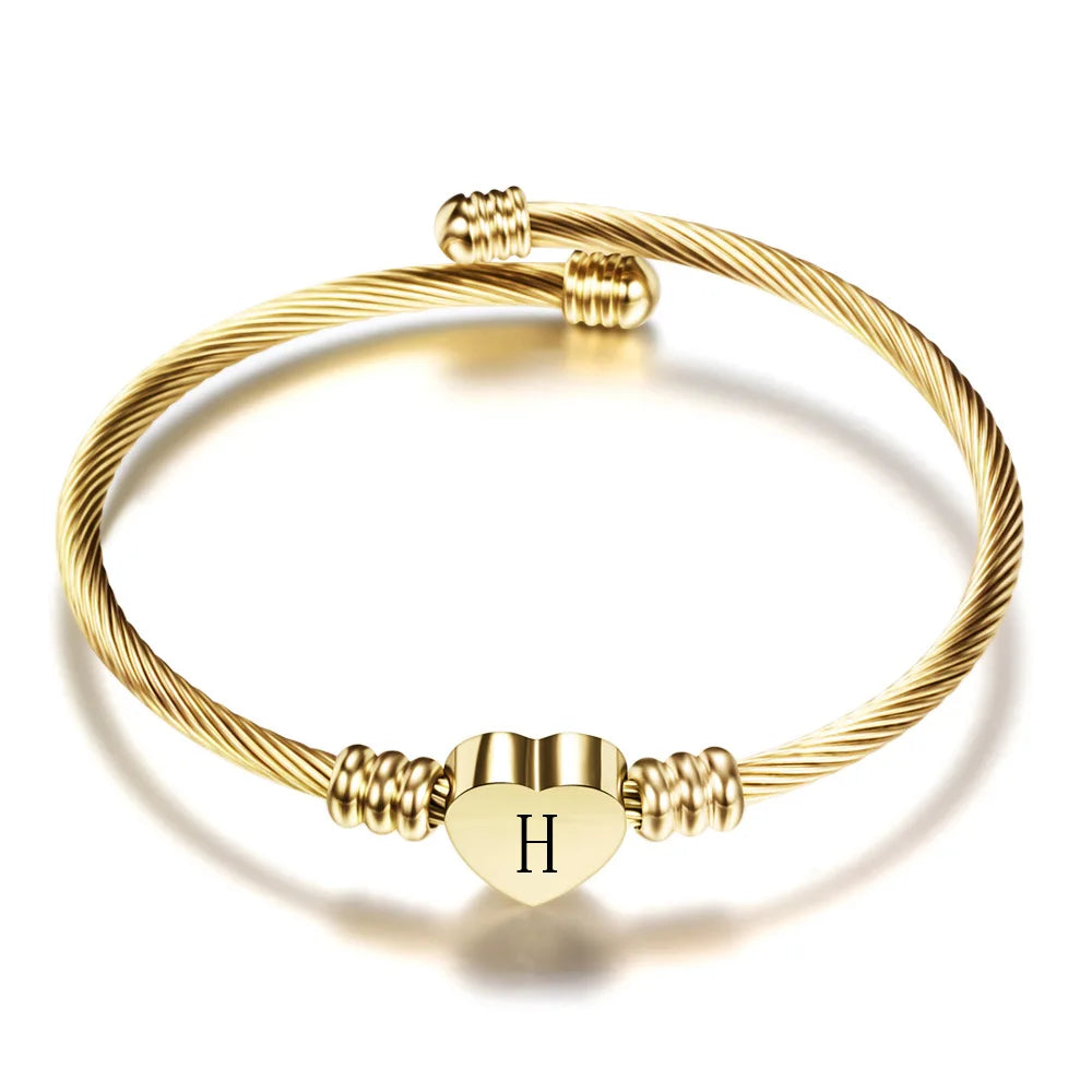 Hjertearmbånd med initial guld h