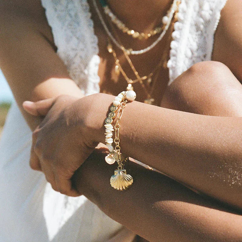 Armbånd med Jakobsmuslingeskal og Perleskal til Kvinder