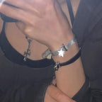 Charmarmbånd med astrologistjerne