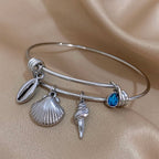 Náramek s přívěsky Mušle stříbrný