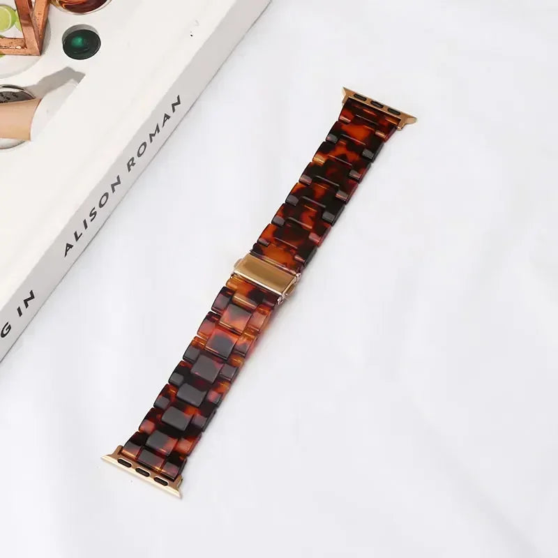 Udskiftningsrem til Apple Watch i brun og guldfarvet resin