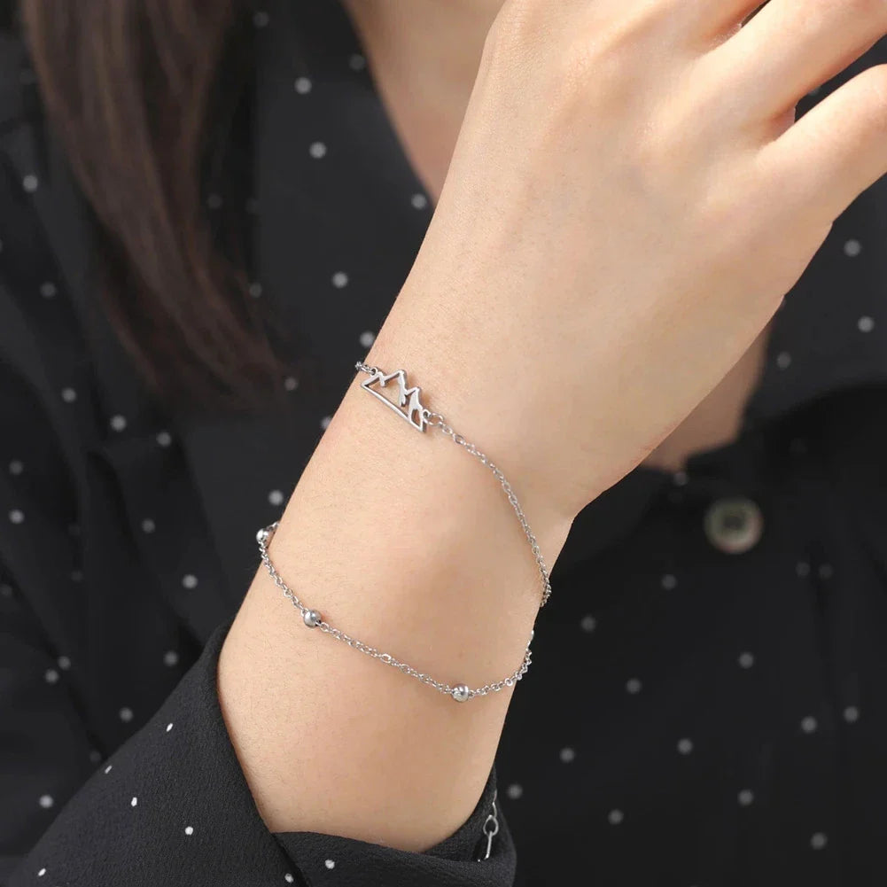 Dobbelt armbånd med bjergvedhæng i sølv