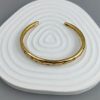 Elegantní náramek se zlatými hvězdami a nebeskými tělesy