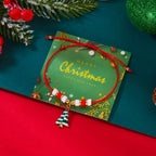 Rebåndsarmbånd med julevedhæng rødt grantræ