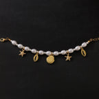 Náramek z korálků s mušlemi