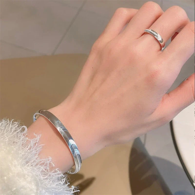 Polert kattøye-stenarmbånd 