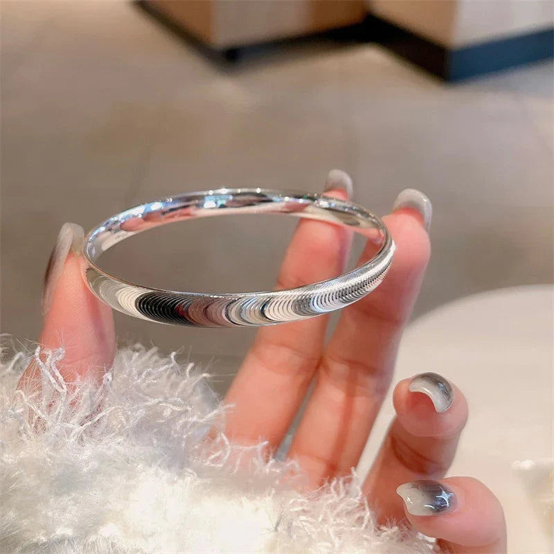 Polert kattøye-stenarmbånd 