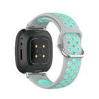 Silikoneurrem til Fitbit Versa 3, Versa 4, Sense 1 og Sense 2 ur i grå og cyan