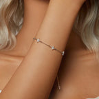 Gourmette-armbånd med fine blomster i gull-zirkon