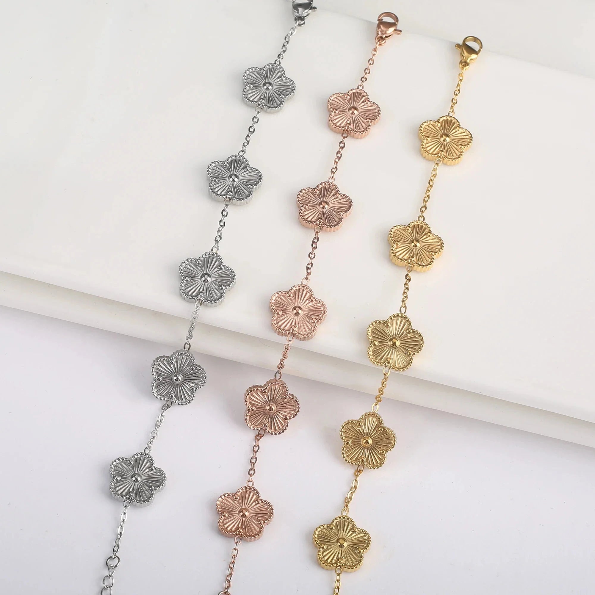 Gourmette-armbånd med blomster med 5 kronblade i rosaguld