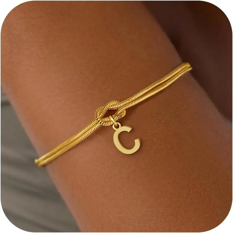 Armbånd med initial og sløjfe - bogstav 