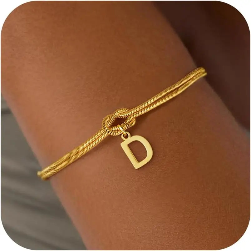 Armbånd med initial og sløjfe - bogstav 