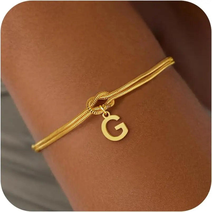Armbånd med initial og sløjfe - bogstav 