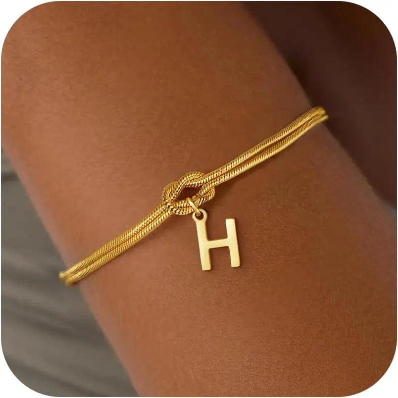 Armbånd med initial og sløjfe - bogstav 