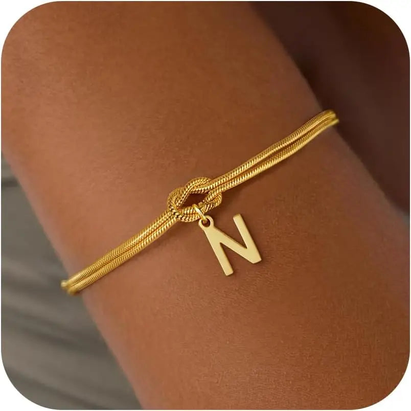 Armbånd med initial og sløjfe - bogstav 