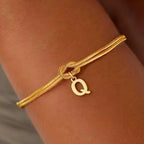 Armbånd med initial og sløjfe - bogstav 
