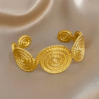 Armring med spiralmotiv