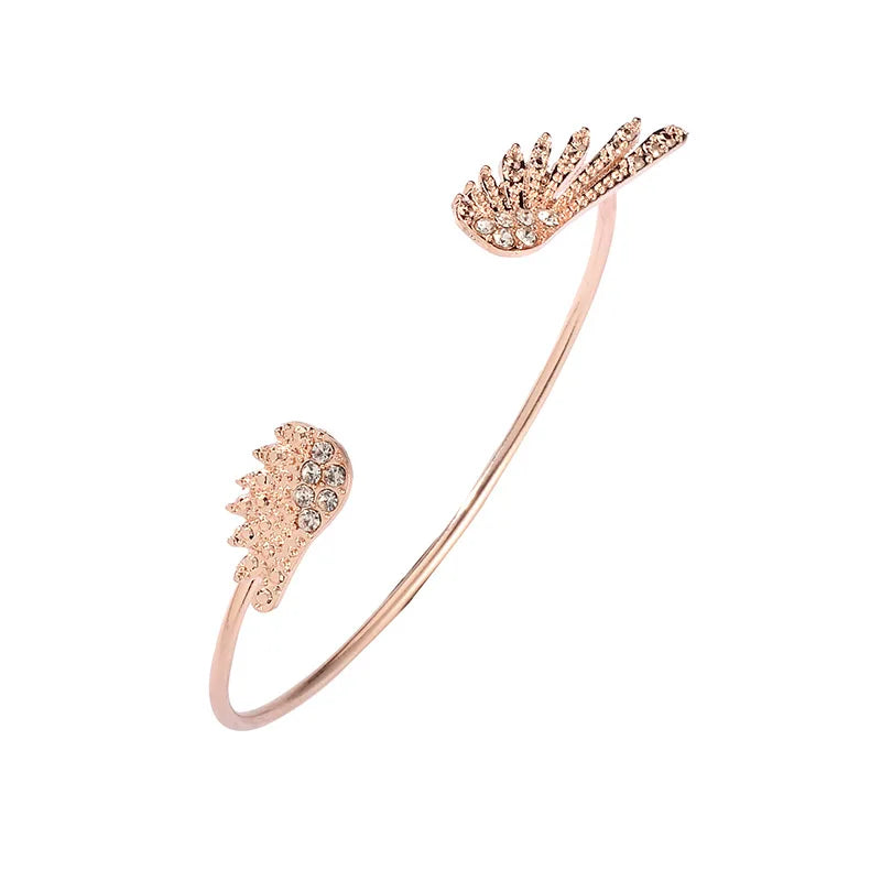 Damarmband med änglavingar i roséguld