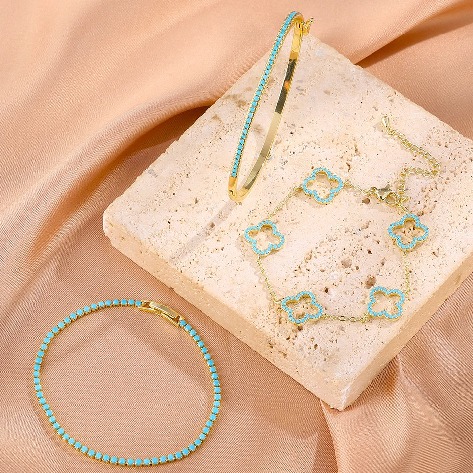 Set om 3 armband med fyrklöver i blå zirkon