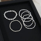 Armbånd med perler og hjerter