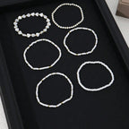 Armbånd med perler og hjerter