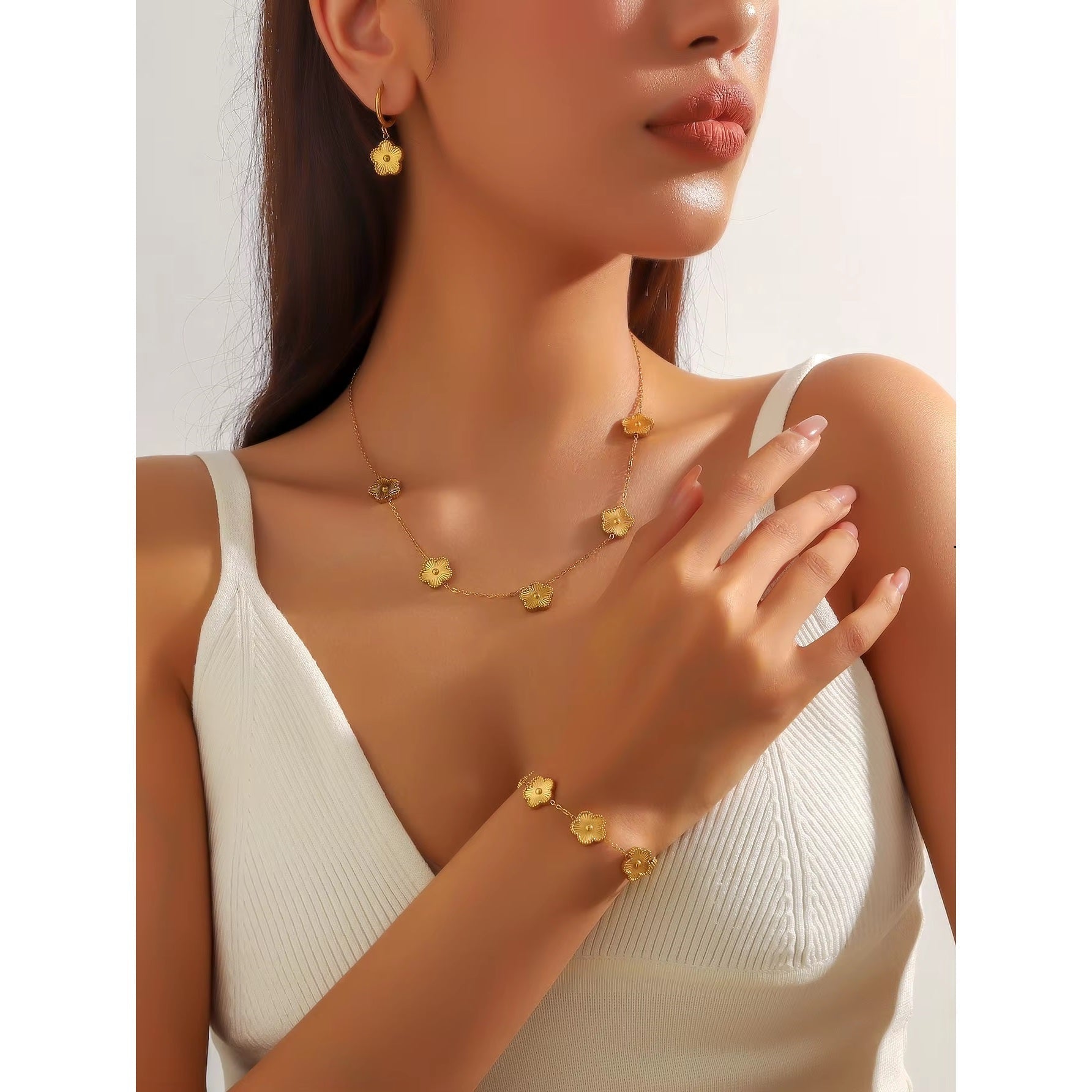 Sæt med 3 Marguerit-smykker i guld 