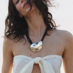 Halskjede med stort skjell- og snegleanheng i sølv