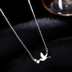 Halskjede med dueanheng