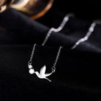 Halskjede med dueanheng