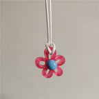 Halskæde med rødt farverigt blomstervedhæng