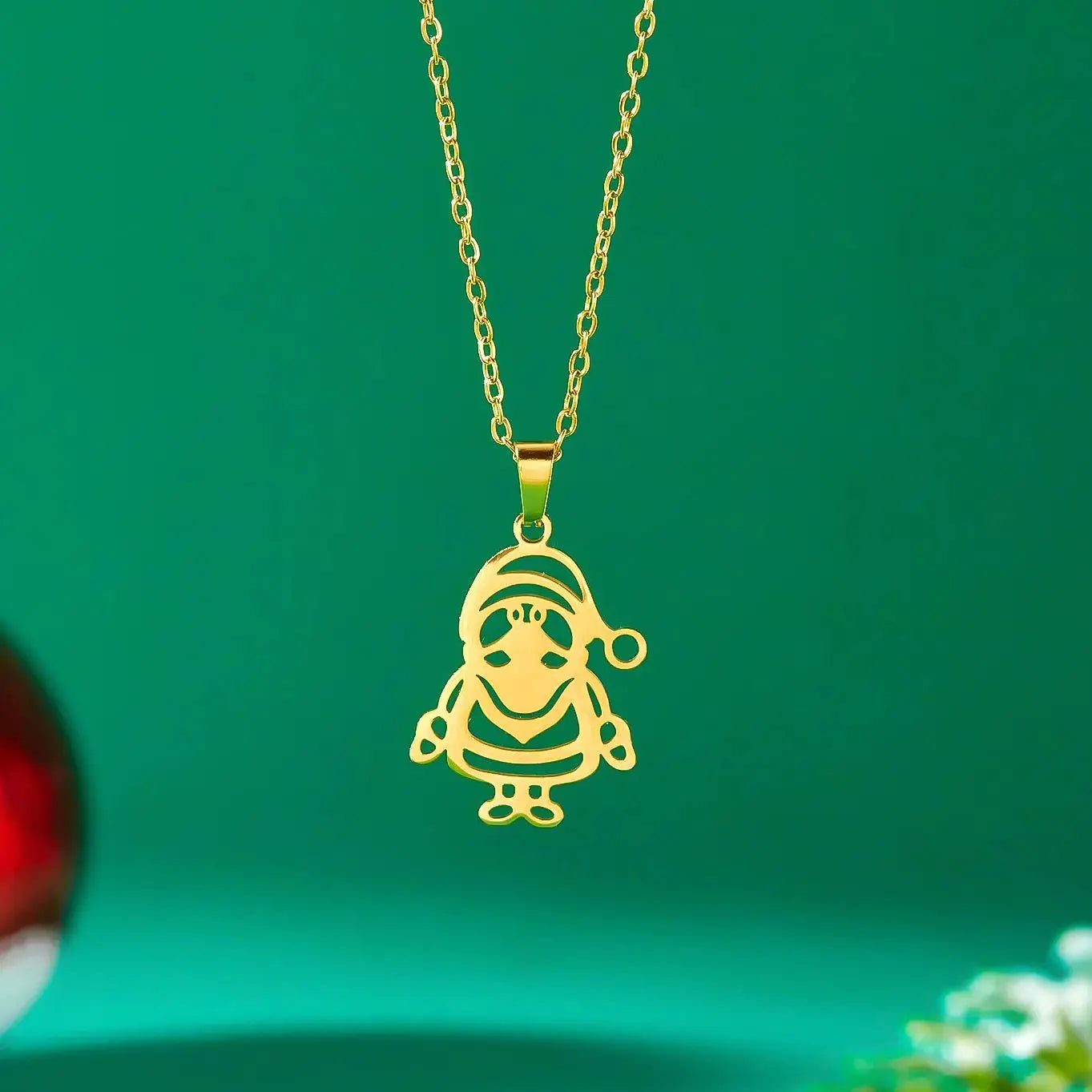 Halsband med vinterjultomte guldhänge