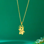 Halsband med vintersnögubbe guldhänge