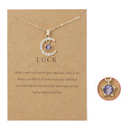 Halskæde med månevedhæng i rhinsten fødselssten