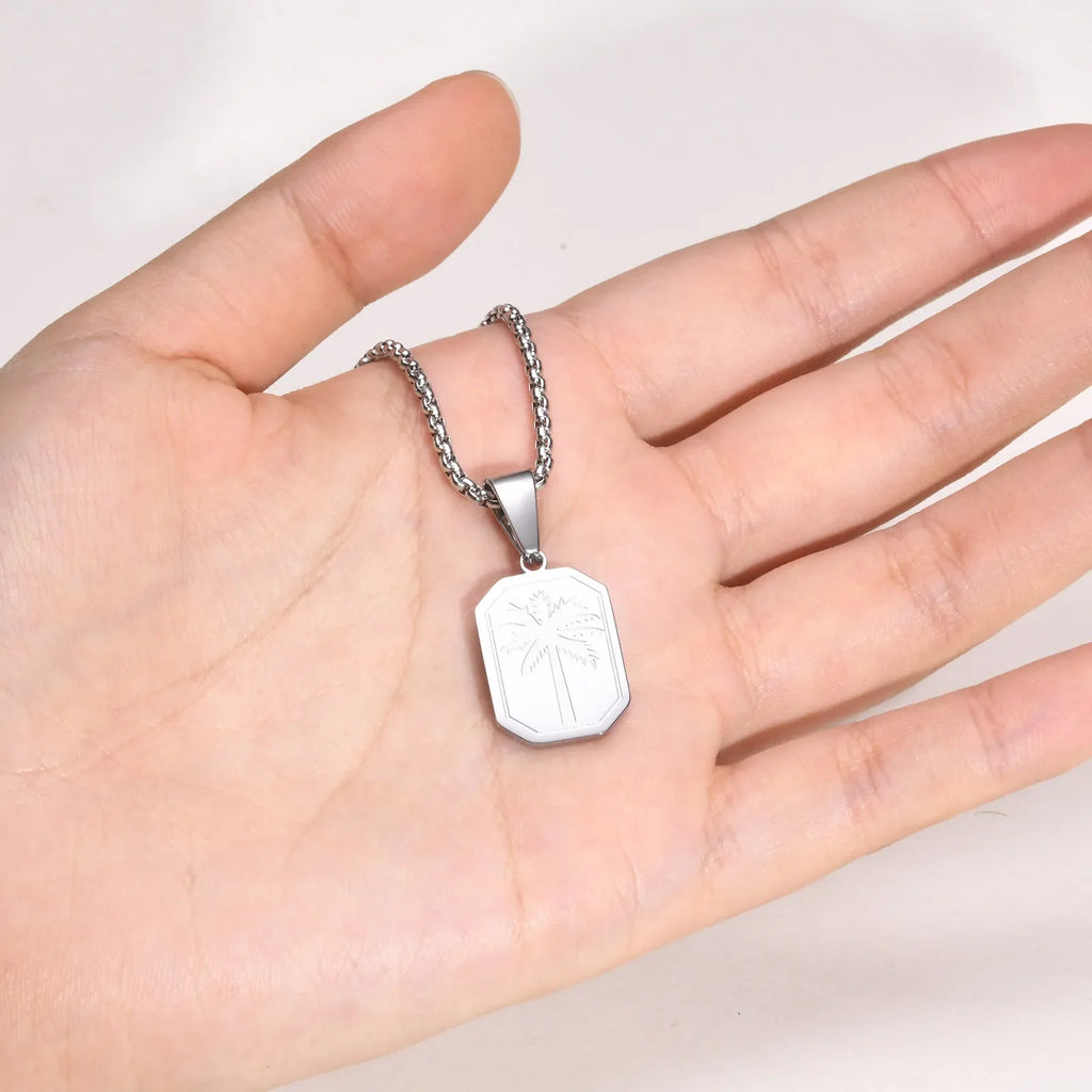 Halsband med geometriskt palmhängsmycke i silverton