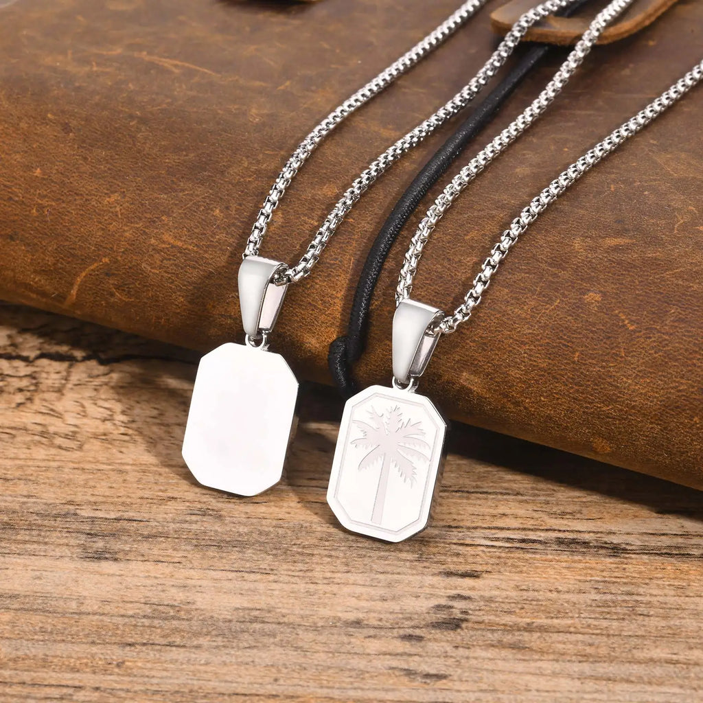 Halsband med geometriskt palmhängsmycke i silverton