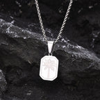 Halsband med geometriskt palmhängsmycke i silverton