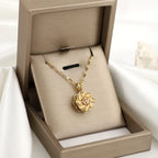 Náhrdelník s otáčivým květinovým přívěskem proti stresu