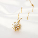 Halskæde med roterende blomst vedhæng mod stress til kvinder