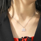 Halskjede med forgylt stjernetegn anheng