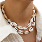 Halsband med vit-vit kaurisnäcka