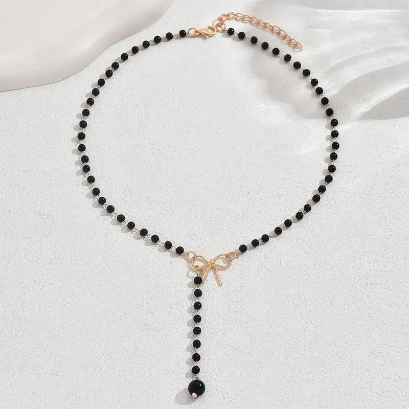 Collier de Perles avec Pendentif Noeud