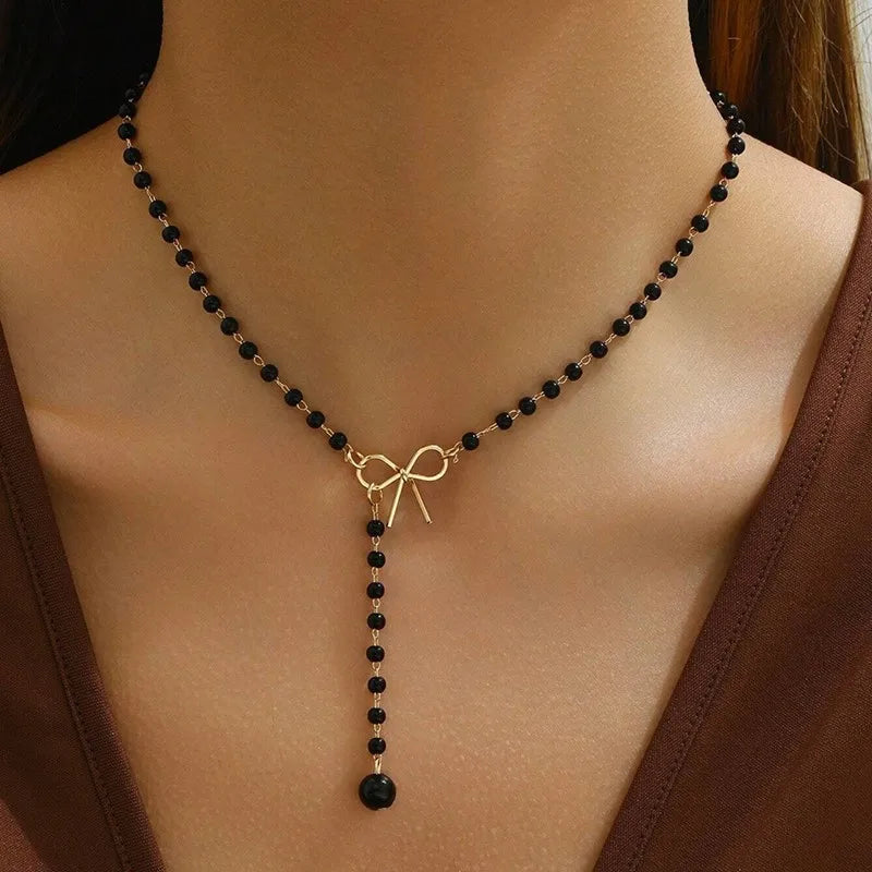 Collier de Perles avec Pendentif Noeud noir