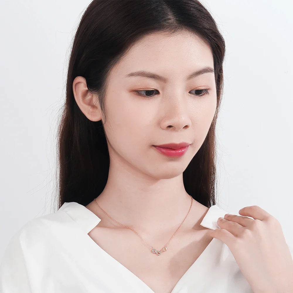 Collier Double Pendentif Infini et Zircon or rose