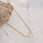 Halskæde med naturlige perler guld