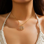 Halskjede med livets tre anheng med krystall