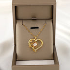 Halskæde vedhæng med hjerte og roterende blomst mod stress