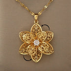 Halskæde vedhæng med smuk roterende blomst mod stress